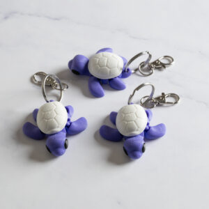 Flexi skildpadde nøglering - Lilla/hvid