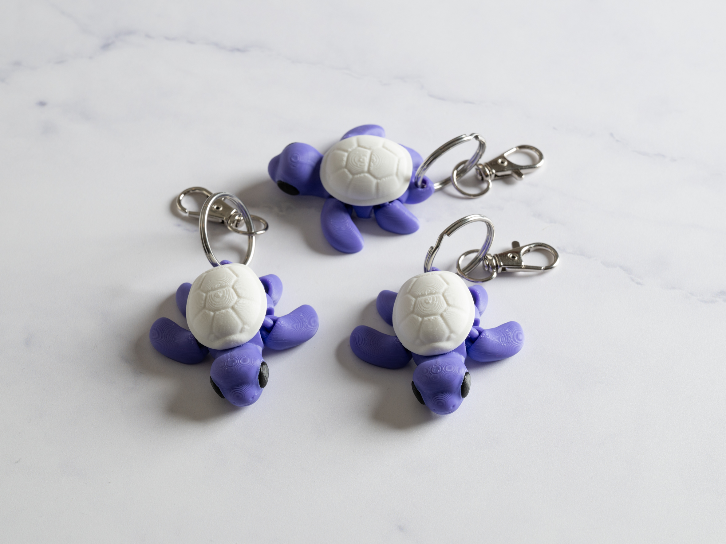 Flexi skildpadde nøglering - Lilla/hvid