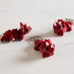 Flexi Triceratops nøglering – Mørk rød