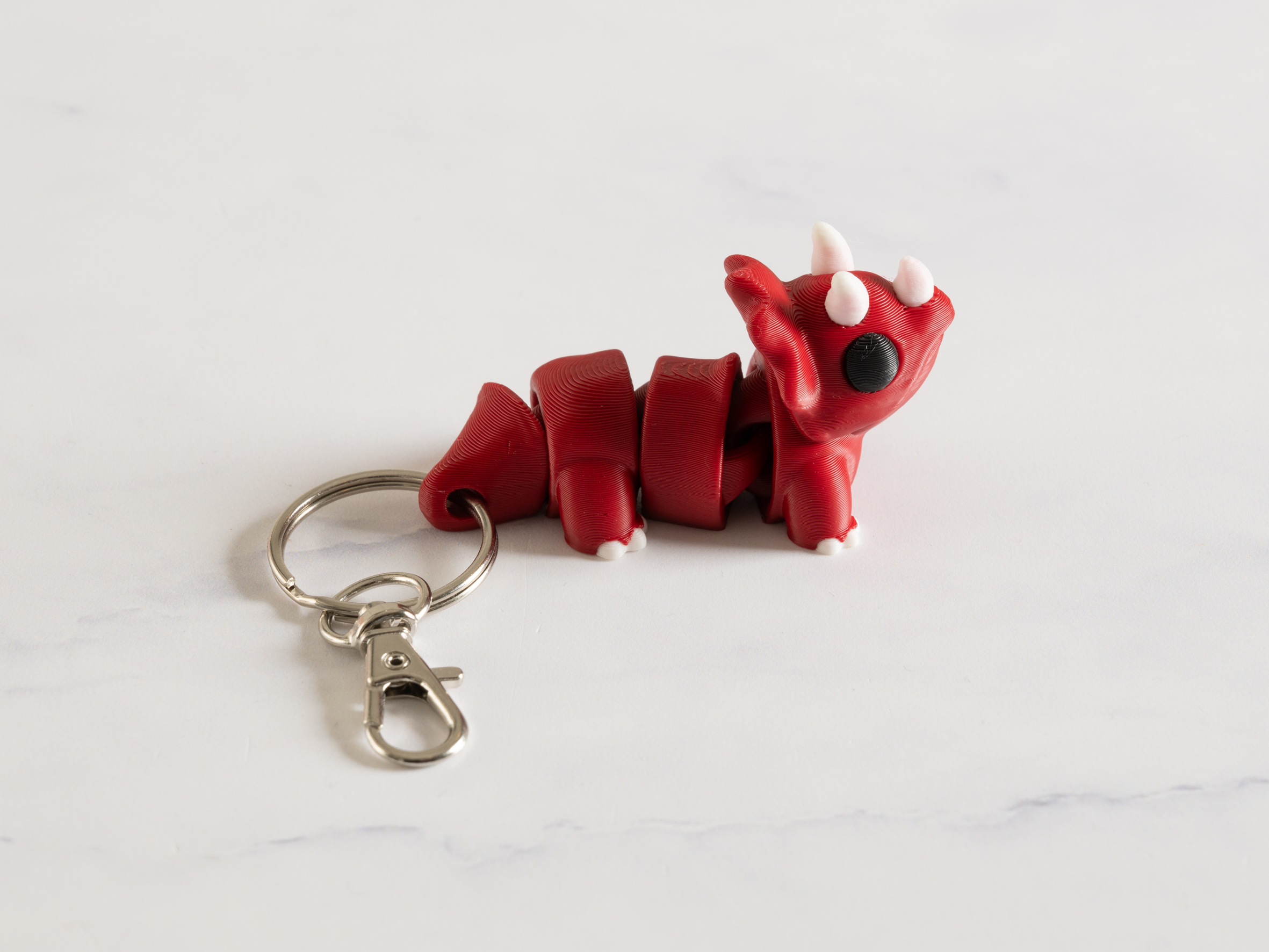 Flexi Triceratops nøglering – Mørk rød - Billede 2